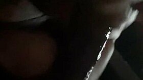 Mature ebony milf gives sloppy blowjob to big cock, spitting and wetting it suggestively.