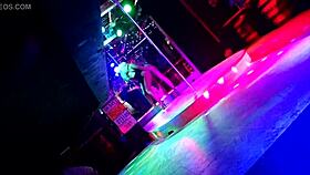 stripper teases at the bar with ripped clothes