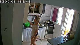 Latina maid washes dishes in tight panties