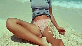 sexy blonde masturbates by the sea hot ass in sand