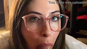 Girl with glasses receives oral attention and finishes inside