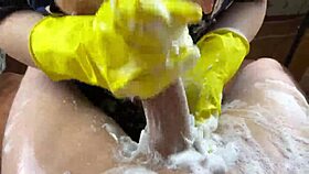 Hot housewife washes cock in kitchen until cum