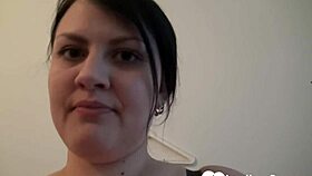 Amateur woman with huge tits plays with dildo.