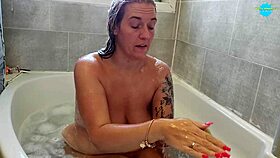 amateur wife relaxing in bath with big tits