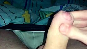 A bisexual guy masturbates to a hot cumshot scene