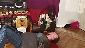 Slim goth domina feeds her slave mouth to mouth