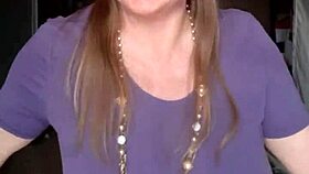 Mariaold shakes her huge bouncing tits and shows them to amateurs.