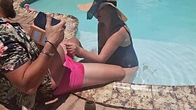 A random guy on vacation gets a pool blowjob from a fat woman.