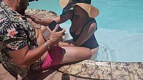 A random guy on vacation gets a pool blowjob from a fat woman.