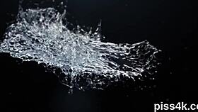 Pretty lesbian friends play with water toys in the garage.