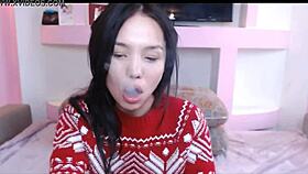Amazing Asian Cam-Girl Sucking Hard on Webcam Blowjob