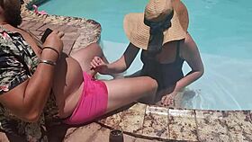 A random guy on vacation gets a pool blowjob from a fat woman.