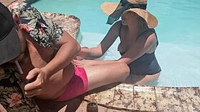 A random guy on vacation gets a pool blowjob from a fat woman.