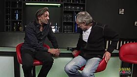 two guys and a blonde woman in a group setting