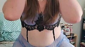 Brunette transsexual in crossdressing solo session riding a pillow