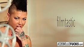 Jezebelle Bond works her big tits and pussy in a solo masturbation session.