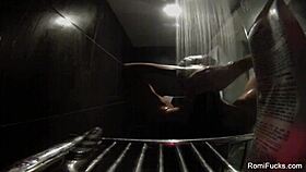 Romi Rain enjoys a relaxing hot shower in the bathroom