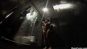 Romi Rain enjoys a relaxing hot shower in the bathroom