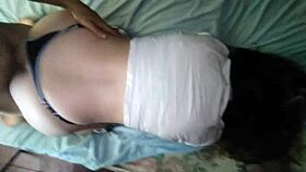 I slide her black thong aside and lift her white shirt, then fuck her doggy style.