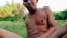 Myanmar gay twink gets naked and takes it in the forest