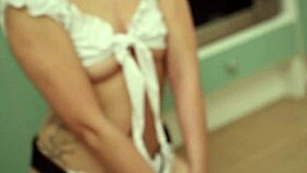 Sofi washes floors with handcuffs and ballgag in bondage flogging