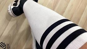 Foot fetish solo with sneakers and socks on.