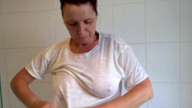 bettie hayward takes a steamy shower, showing off wet natural tits.