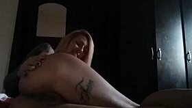 Hot blonde fingers her pussy in friend's house.