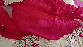 Couple in saree shares intimate homemade touch.