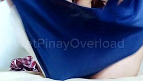 Asian beauty masturbates with two fingers in classroom.