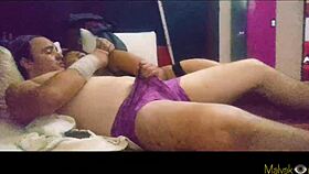 He watches her changing, noticing her big tits, and she pretends not to notice as they engage in oral sex