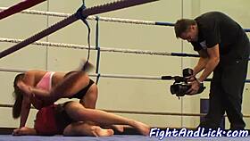 European babe in amateur wrestling with another in an athletic match
