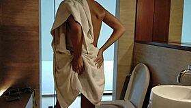 standing up to piss in clubhouse shower, hot pee drips down legs