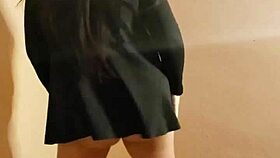 Gostosa performs a teasing striptease, ripping clothes to reveal small tits.