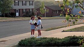 Majorette strips bikini by the pool!