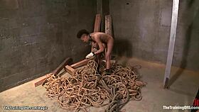 Ebony slave submits to bondage training?
