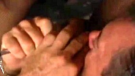 A babe indulging in footjob and handjob fetish with sucking.