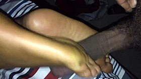 retro ebony footjob scene in classic blue film style