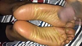 retro ebony footjob scene in classic blue film style