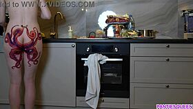 I'm a naked housewife cooking dinner, ignoring you with my tattooed ass