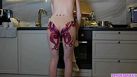 I'm a naked housewife cooking dinner, ignoring you with my tattooed ass