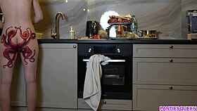 I'm a naked housewife cooking dinner, ignoring you with my tattooed ass