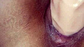 latina explores her big dildo in the bedroom