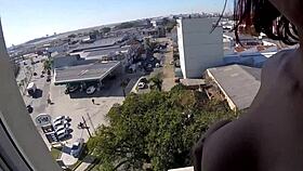 sarada enjoys naked moment at hotel window overlooking airport