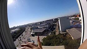 sarada enjoys naked moment at hotel window overlooking airport