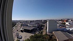 sarada enjoys naked moment at hotel window overlooking airport