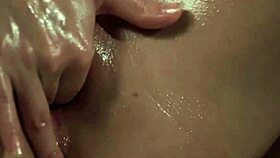 Latvian girl masturbates her oiled huge tits