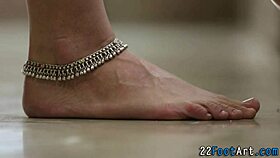 Foot fetish babe performs oral sucking and fingering