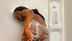 ebony girl enjoys a sexy solo shower bathing wet