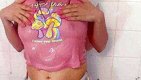 The big ass stepsister bathes in the shower wearing panties and thong.